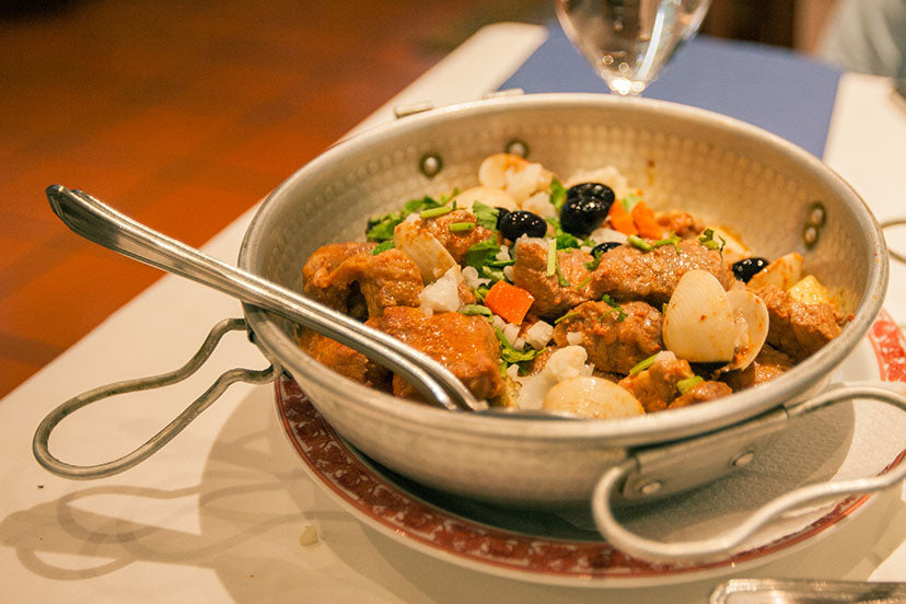 Carne de porco à alentejana