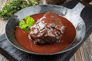 Bochechas de vaca com batata doce cozida ao vapor